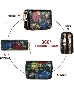 Vues détaillées du portefeuille noir en cuir pour femme avec reliefs floraux et double fermeture