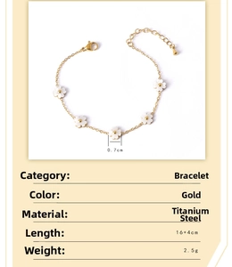 Detailed view of titanium steel bracelet with white shell flowers and adjustable chain
