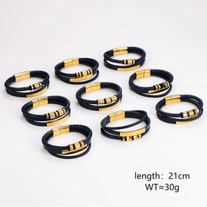 Men's multi-layer woven leather bracelet with gold metal accents and magnetic clasp