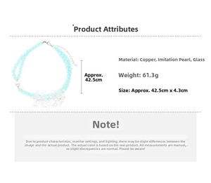 Detail view of handmade light blue beaded necklace with white acrylic flower charms