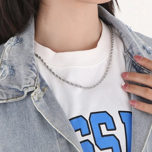 Polished silver stainless steel rope chain necklace for men and women on model