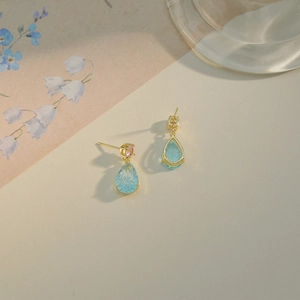 Elegant water drop earrings with light blue crystals and pink accents in gold frames