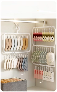 Detail view of white PP multi-clip laundry drying rack with 18 and 26 clips for socks