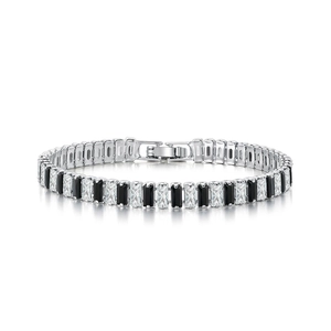 Detailed macro view of silver tennis bracelet with black and clear rectangle zircons