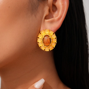 Elegantes pendientes geométricos con ágata ámbar y diseño hueco de metal dorado