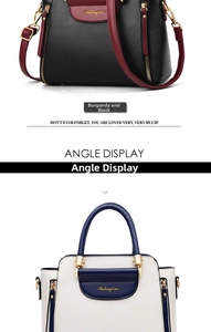 Detail of color-block leather handbags with metal zippers and golden brand logo