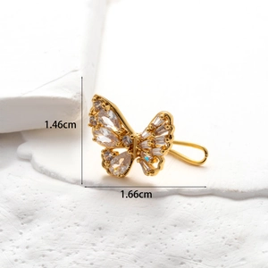 Macro shot showing dimensions of butterfly ear cuff with micro-pave cubic zirconia