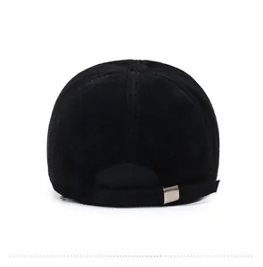 Rear view of faux mink baseball cap with adjustable silver metal buckle and soft texture