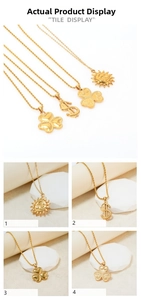 Macro shot of four gold titanium necklaces with clover and dollar sign charms on rope chains