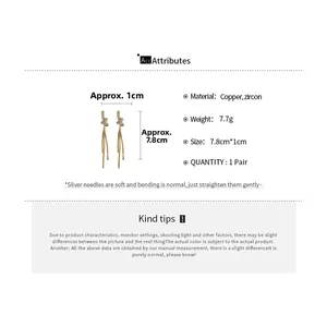 Detailed specs of gold tassel knot earrings with copper zircon and 7.8cm length