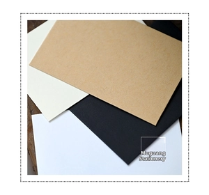 Macro detail of multi-color retro envelopes showing fine paper texture and clean edges