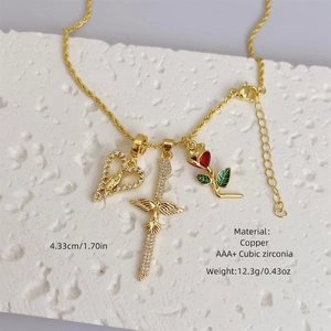 Gold plated copper necklace with cross, rose and heart pendants featuring AAA cubic zirconia
