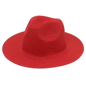 Detail of red woven Panama hat straw texture and classic Fedora crown structure