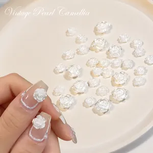 3D pearlescent white camellia nail charms and resin flower jewelry for manicure art