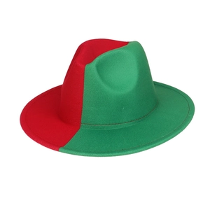 Detailed side view of two-tone red and green wool fedora hat with wide brim