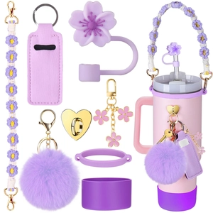 Detail view of purple flower woven strap and mini storage pouch for Stanley tumbler