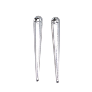 Polished silver conical spike pendants for jewelry making with top holes on white background