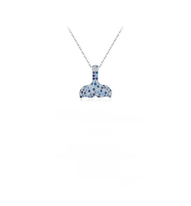 Detailed close-up of S925 sterling silver mermaid tail pendant with blue gradient crystals