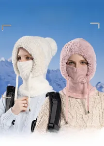 Close-up of knit winter hat with thick lining, ear flaps and integrated face mask