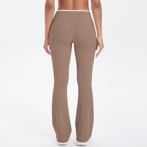 Detail of high waist yoga flare pants with white contrast trim and butt lifting design