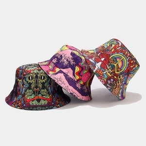 Three vibrant graffiti bucket hats featuring ethnic totems and artistic wave prints
