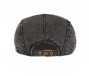 Rear view of washed canvas beret showing the vintage copper adjustable metal buckle