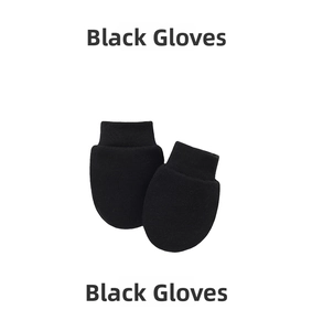 Detail showing soft black knit baby mittens with elastic ribbed cuffs for newborn protection