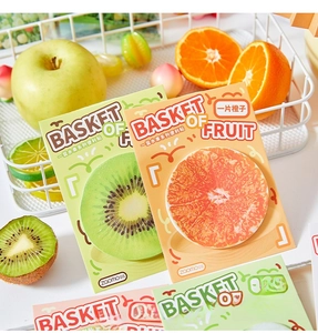 Macro shot of realistic fruit shaped sticky notes including orange and apple designs