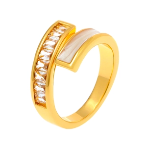 Golden wrap ring with baguette-cut zircons and white pearl-like inlay accents