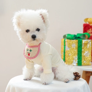 Detail of dog Christmas bib with reindeer embroidery and cream long sleeve pet shirt