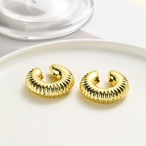 Golden textured C-shaped clip-on earrings with twisted minimalist design for women