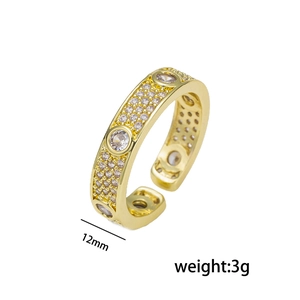 Luxurious gold-plated open bangle with pave cubic zirconia and round gemstone accents