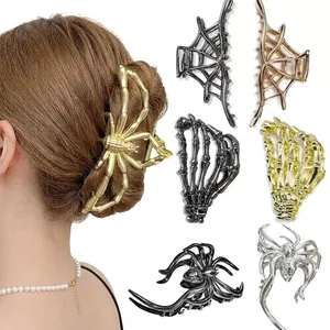 Gothic spider and skull metal hair claws in silver and gold for Halloween styles