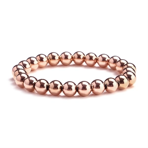 Polished rose gold stainless steel beaded elastic bracelet with high-shine finish
