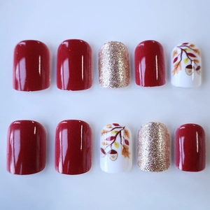 Autumn style short square press-on nails with burgundy, gold glitter and leaf patterns
