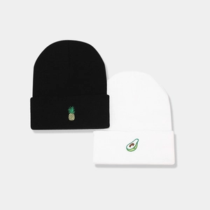 Set of black and white knitted beanies with pineapple and avocado fruit embroidery