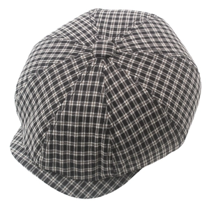 Classic British plaid newsboy cap with black and white checkered octagonal pattern