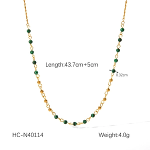 Detail of 18K gold plated necklace showing 43.7cm length and green natural stone beads