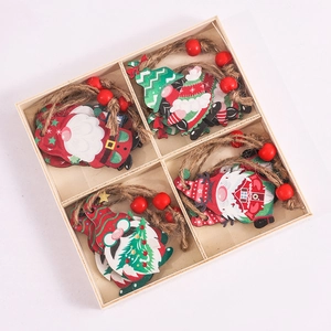 Detail of 12-piece Christmas wooden gnomes and tree ornaments in a divided storage box