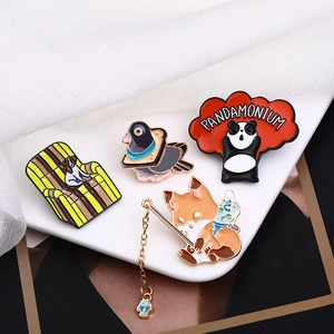 Creative enamel animal pins set featuring dog, panda, fox, and pigeon on white plate