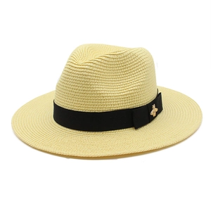 Panama style straw sun hat for men with black ribbon and a gold bee metal buckle