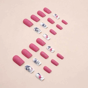 Square matte press-on nails with pink glitter and purple lotus flower designs