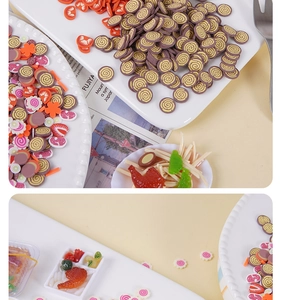 Detailed view of assorted vegetable and fruit polymer clay slices for DIY slime and crafts