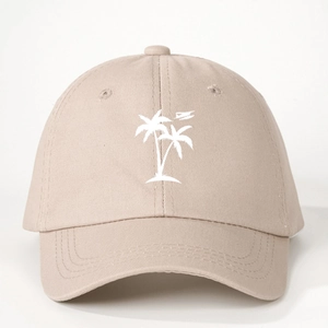 Beige baseball cap with white coconut tree print featuring adjustable strap and sun protection