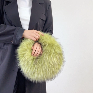 Macro detail of lime green faux fur ring bag with long plush texture and punk style