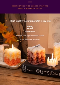 Macro detail of handmade pumpkin skull scented candle crafted from soy and paraffin wax