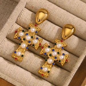 Vintage 18K gold plated cross earrings with pearls and colorful gemstones in a jewelry box
