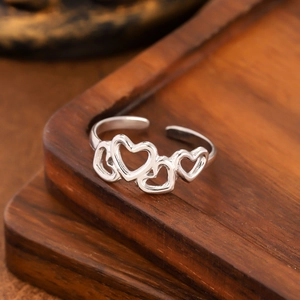 Adjustable silver irregular hollow heart stainless steel ring for women in minimalist style