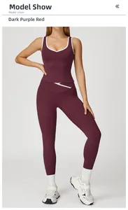 Detail of dark burgundy yoga set with contrasting white trim on high waist leggings and vest