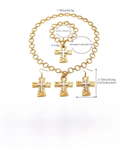 Detailed size and weight chart for the gold-tone cross necklace, bracelet, and earrings set